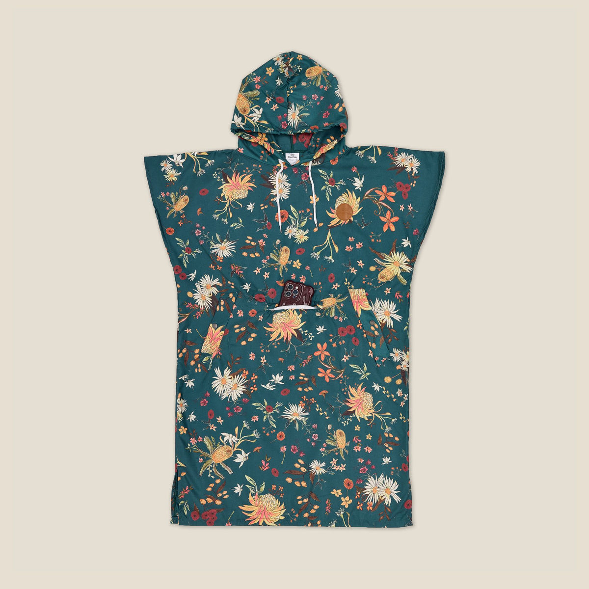 Native Botanical adult hooded towel poncho, dark green Australian wildflower print, studio flat lay