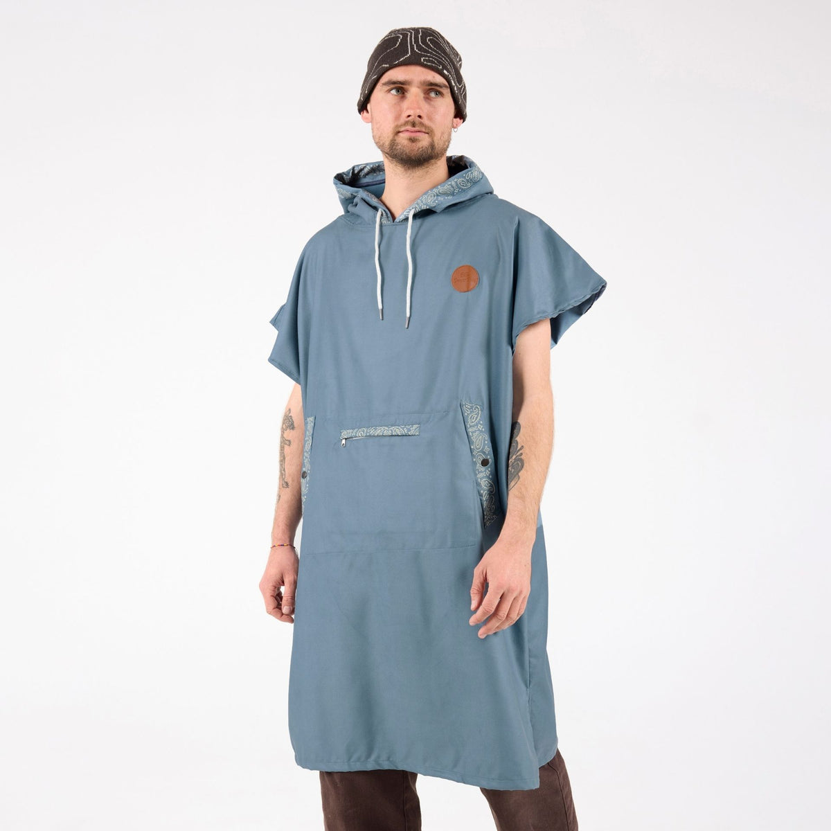 Venice adult hooded towel poncho, dusty blue paisley bandana print, front view on model