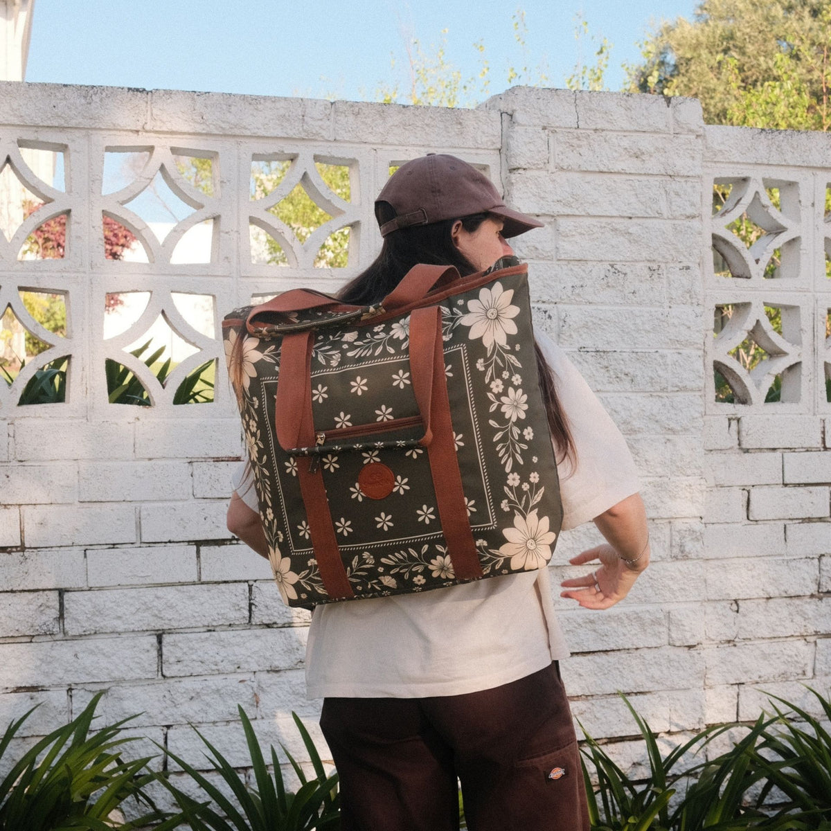 Eden beach tote bag, olive green floral bandana print, worn as a backpack