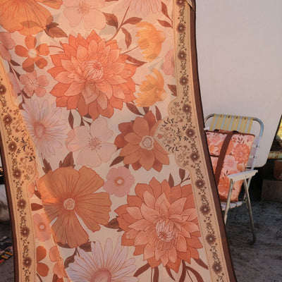 Summer Muse sand free beach towel, peach retro 70s floral print, print close up